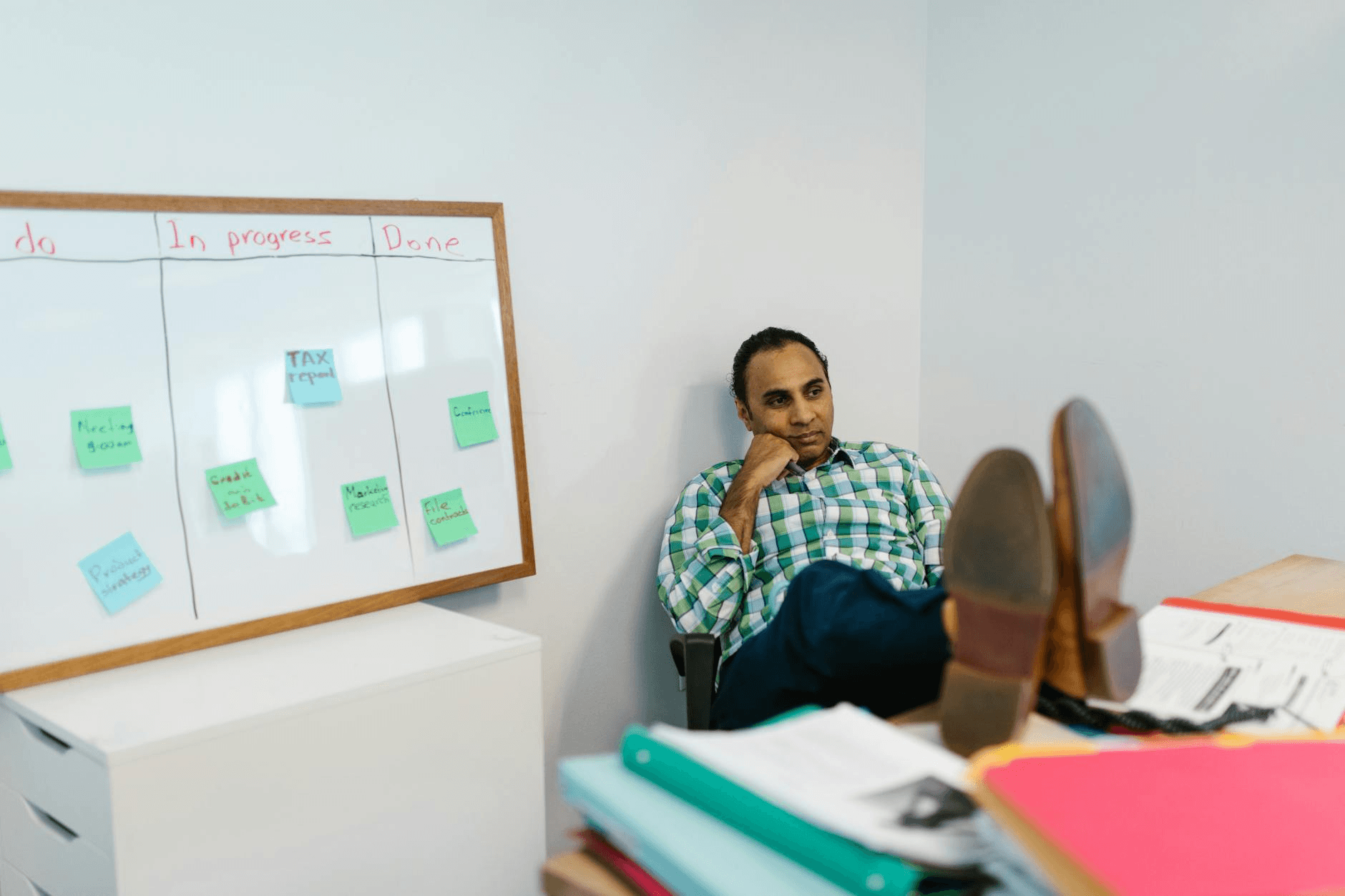 product manager reviewing project management platform architecture for Monday.com alternative build