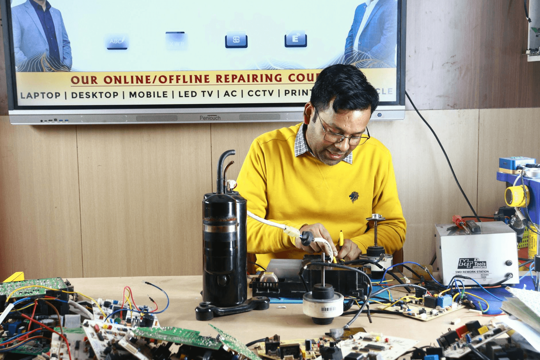 Appliance repair dispatcher reviewing technician job board and schedule on a computer