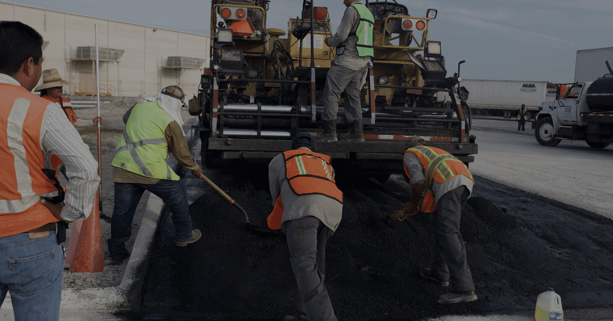 Dashboard showing asphalt tonnage estimator, equipment schedule, and daily production log for a paving contractor