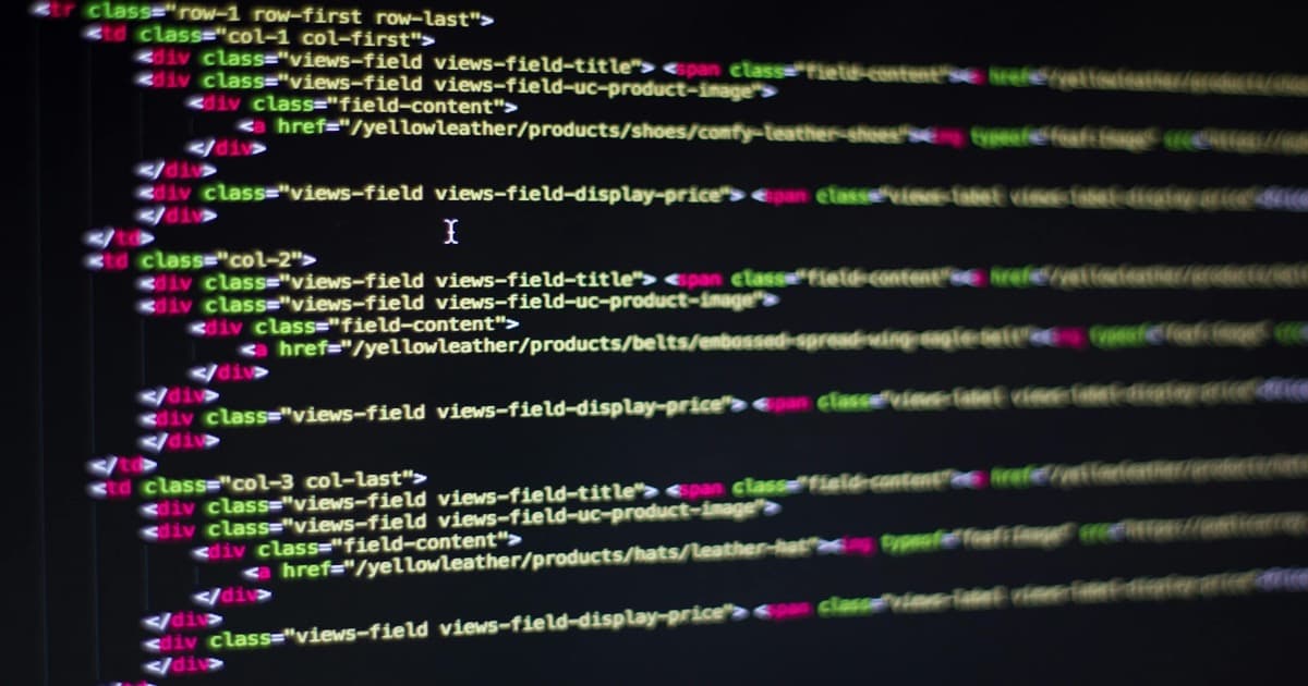 AI engineer reviewing LLM fine-tuning training results on monitor
