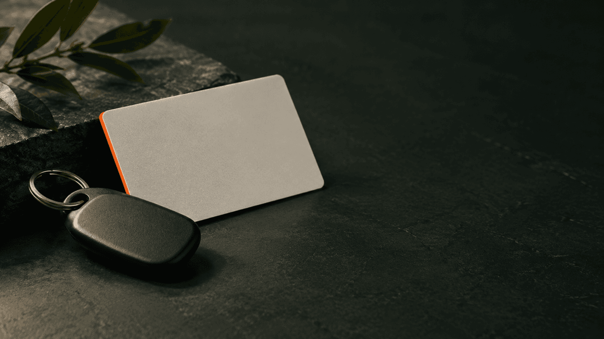 Parcel locker key fob and rewards card representing the OOHPOD customer rewards platform